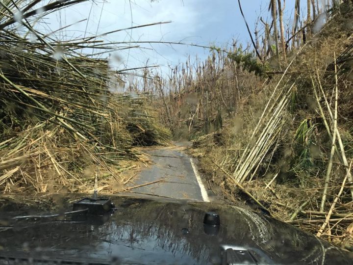 First Responder Robert Noxon's photo of blocked road cleared just enough for emergency vehicles to get through