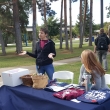 Nursing Club members chat with a student